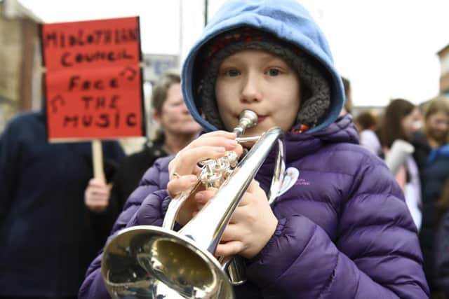 A musical flash mob gathered outside the council chambers in Dalkeith. Picture: Lisa Ferguson