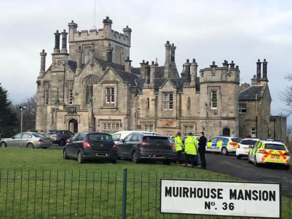 There was a large police presence outside of Muirhouse Mansion. Pic: Lisa Ferguson