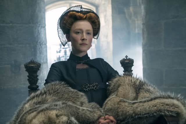 This image released by Focus Features shows Saoirse Ronan as Mary Stuart in a scene from "Mary Queen of Scots." (Liam Daniel/Focus Features via AP)