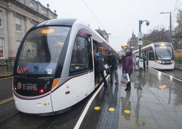 The council administration is determined to press ahead with the tram line extension to Leith. Picture: Lesley Martin
