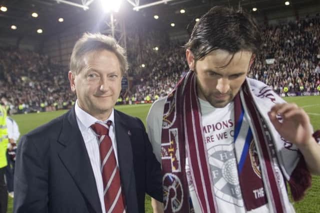 Hearts owner Vladimir Romanov and midfielder Paul Hartley after the club reached the Champions League qualifiers. Picture: SNS