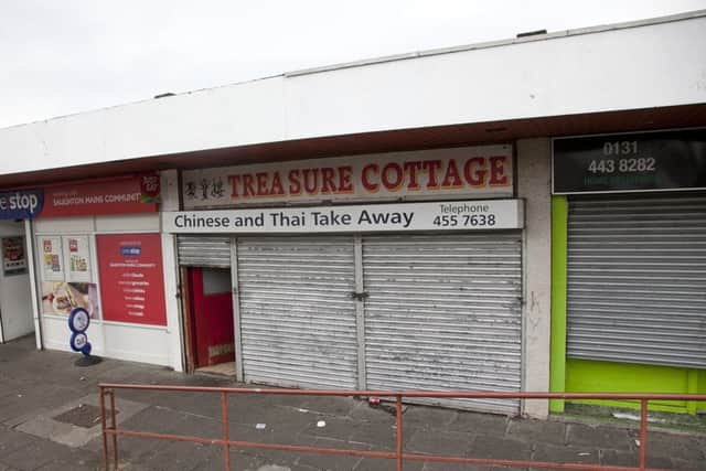 Saughton Mains Gardens shops where a chinese takeaway was raided last night. Picture: TSPL
