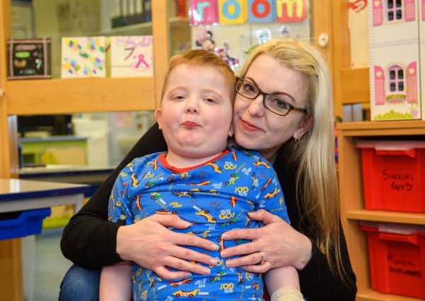 Karen Gray, at the hospital with her son, Murray Gray, who suffers from a rare form of epilepsy