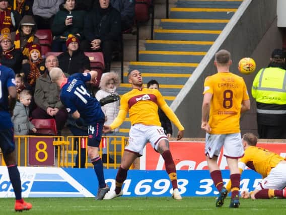 Steven Naismith equalises for Hearts during the first half.