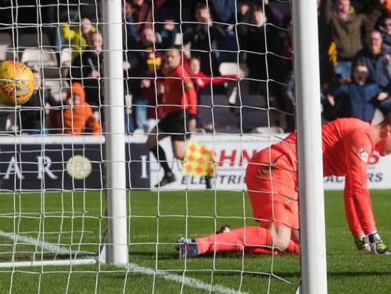 Colin Doyle concedes a stoppage time goal to cost Hearts a result at Fir Park.