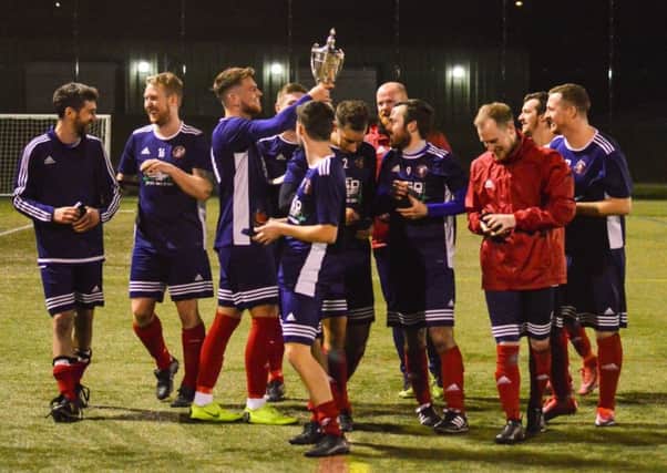 Salvesen AFC celebrate winning the Challenge Cup. Pic: Vicky French Photography Scotland