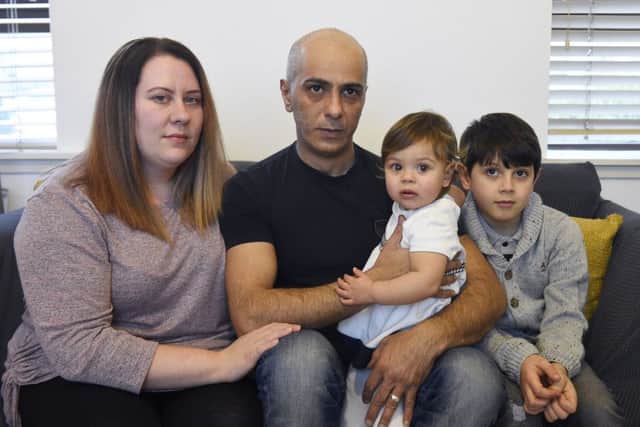 Asam and Kim Al-Abodi with kids Aziz (8) and Alaia (1). Pic: Greg Macvean