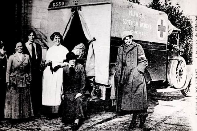The picture, entitled John Patrick, was taken outside Royaumont Hospital, France in December 1914.  Obstetrician Frances Ivens & actress Cicely Hamilton are among the team pictured.