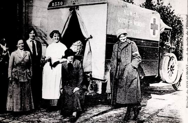 The picture, entitled John Patrick, was taken outside Royaumont Hospital, France in December 1914.  Obstetrician Frances Ivens & actress Cicely Hamilton are among the team pictured.