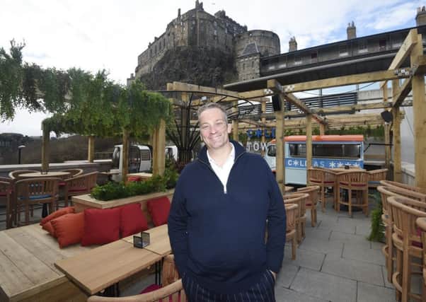 Owner Nic Wood on the iconic roof terrace of the new Cold Town House.
Pic - Greg Macvean.