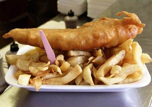A portion of fish and chips, untouched by chippy sauce. Picture: PA