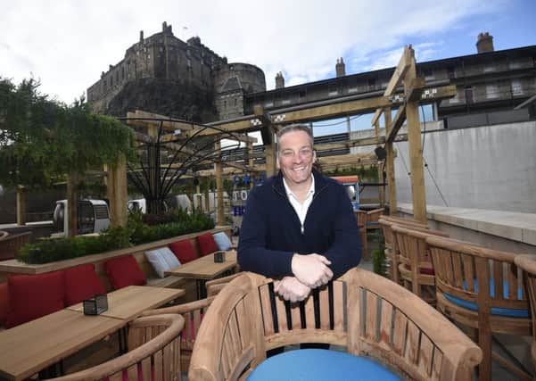 Cold Town House is a new bar in the Grassmarket which is split over 3 levels. Pictures is owner Nic Wood on the roof terrace. Pic: Greg Macvean