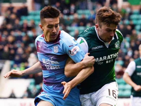 Lewis Stevenson tussles with Cammy Kerr during Hibs' 2-2 draw with Dundee at Easter Road in November