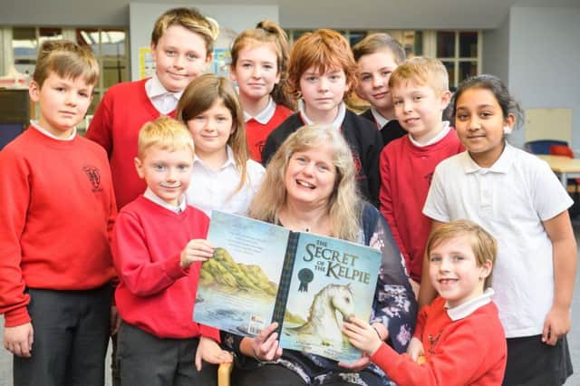 Children's Author Lari Don with Kids from the pupil council at Hermitage Park Primary School. Ian Georgeson Photography