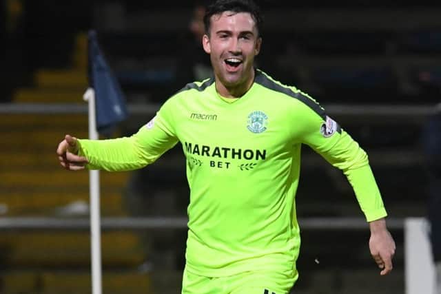 Stevie Mallan celebrates scoring to make it 4-1 to Hibs