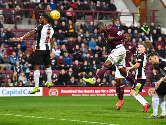Clevid Dikamona headed Hearts in front before St Mirren drew level at Tynecastle.