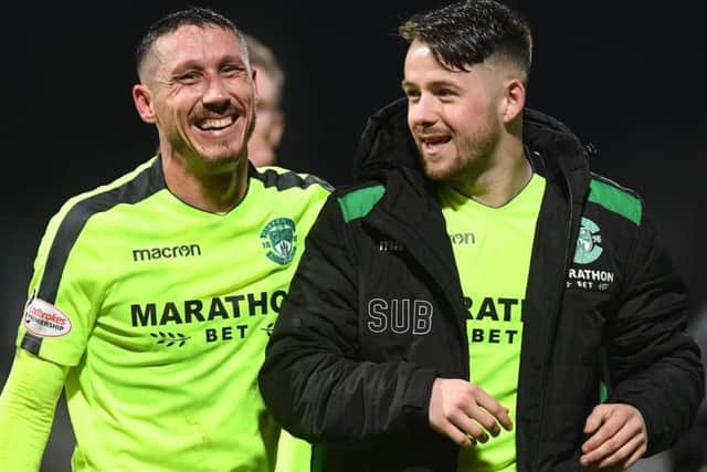 Mark Milligan, left, with Hibs team-mate Marc McNulty at Dens Park