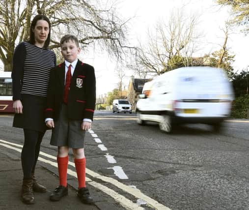 Benjamin Yates, 12 and his mother Kate Yates
by the Murrayfield Hotel. Pic: Lisa Ferguson