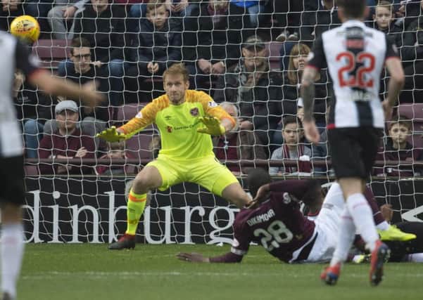 Zdenek Zlamal made a superb save to prevent Hearts defender Clevid Dikamona scoring an own goal against St Mirren on Saturday