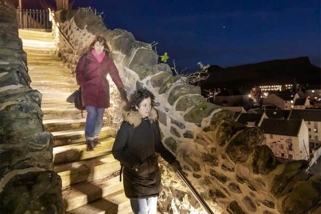 Two women walk down the newly-refurbished Jacob's Ladder. Picture: Tom Duffin