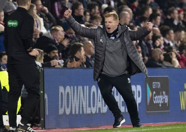 Neil Lennon celebrates as his side go in front at Tynecastle