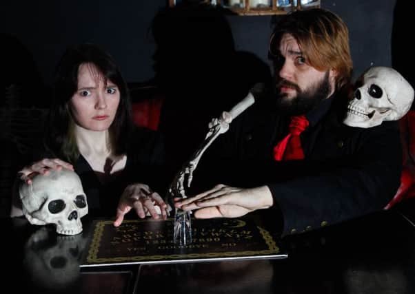 Paranormal Illusionist Ash Pryce and his producer/tour manager/co-star Emily Ingram who will be performing a seance show at The Banshee Labyrinth