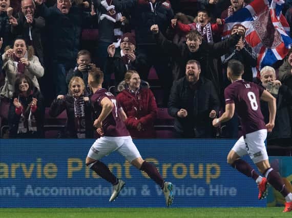 Hearts showed their resolve to draw level against the champions-elect with ten men.