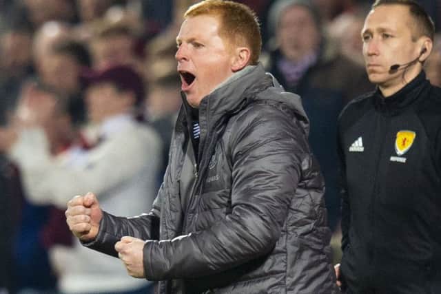 Celtic manager Neil Lennon celebrates Jamie Forrest's opening goal in the victory against Hearts on Wednesday