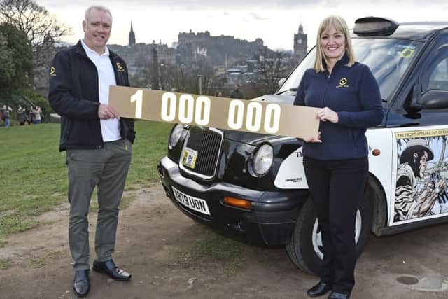 Albert & Julie Smith
with their taxi that's done a million miles around Edinburgh


 Picture: Neil Hanna