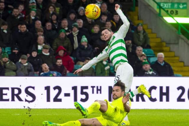 Darren McGregor slides in on Oliver Burke during the last meeting between the two sides. Picture: SNS Group