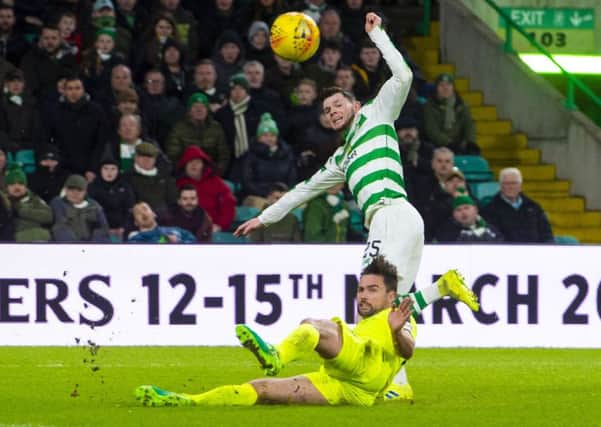 Darren McGregor slides in on Oliver Burke during the last meeting between the two sides. Picture: SNS Group