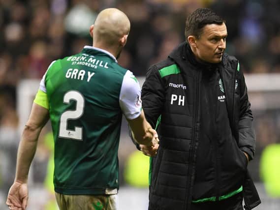 Hibs head coach Paul Heckingbottom shakes David Gray's hand at the full-time whistle. Pic: SNS