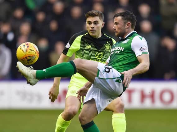 Lewis Stevenson tries to get the better of James Forrest during Hibs' defeat by Celtic. Pic: SNS