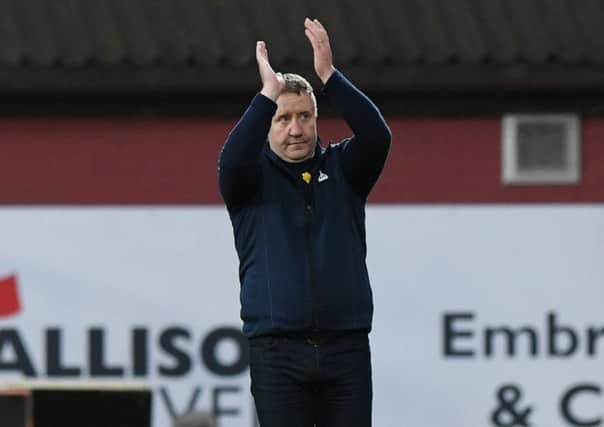 Inverness manager John Robertson applauds the fans at full time/ Picture: SNS/Paul Devlin