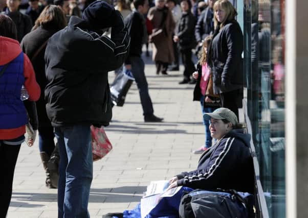 A beggar on Princes Street. Picture: TSPL
