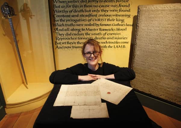 Vicky Garrington, curator at Museum of Edinburgh with Mary Queen of Scots original letters.