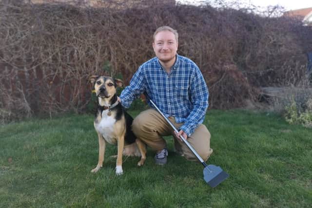 Greg Mahoney, who has launched Super Pet Scooper in East Lothian, with his rescue dog Rocco
