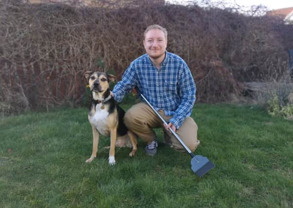 Greg Mahoney, who has launched Super Pet Scooper in East Lothian, with his rescue dog Rocco