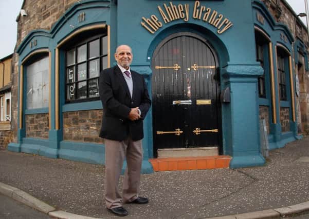 Mohammed Akram MBE, pictured outside the former Abbey Granary Pub in Newtongrange in 2017.