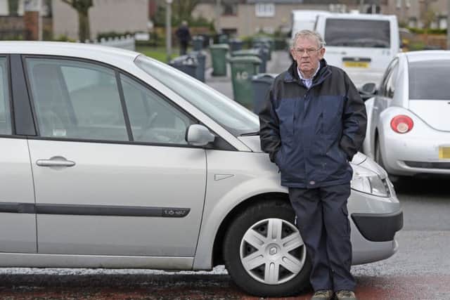Ronnie Scotland is so sick of the fact that the local bins haven't been collected he has parked his car at the end of the street and plans to remain there until the police come.
Pic: Neil Hanna Photography
.