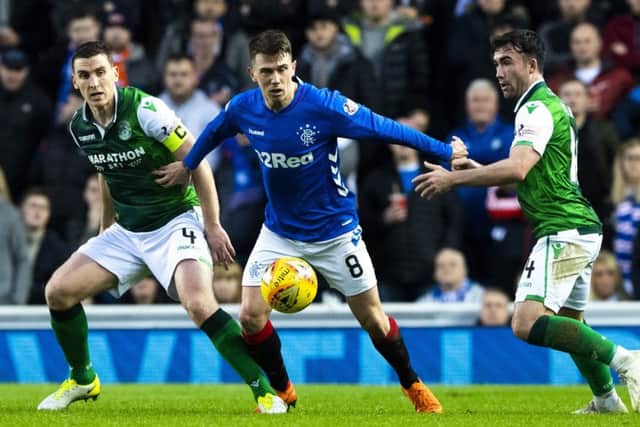 Paul Hanlon, Ryan Jack and Stevie Mallan in action during the last match between the two sides. Picture: SNS Group