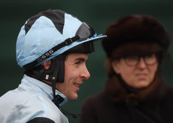 Aidan Coleman, who is stable jockey for Herefordshire trainer Venetia Williams, right