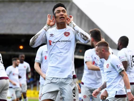 Sean Clare celebrates after scoring for Hearts at Dens Park