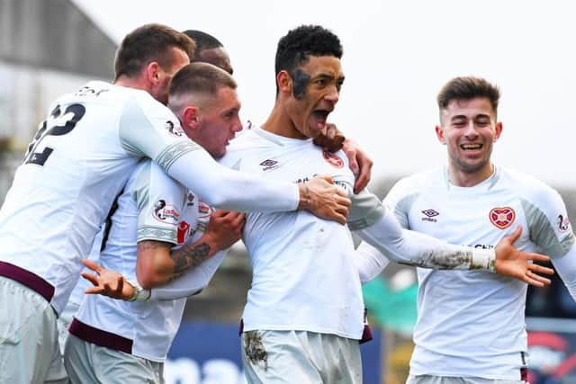 Sean Clare celebrates scoring the only goal for Hearts