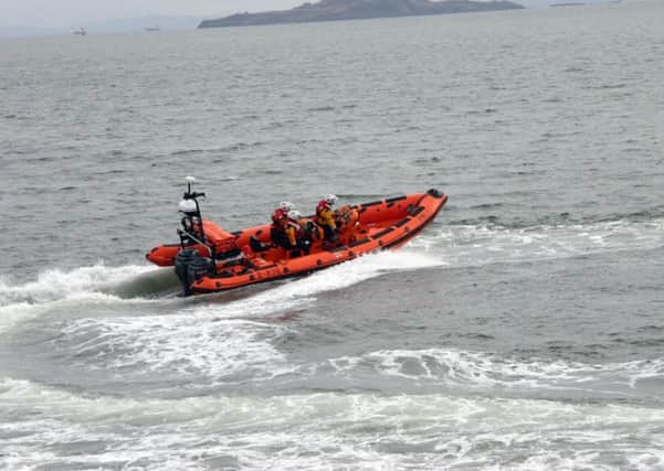 The two kayakers were picked up by Kinghorn RNLI Lifeboat