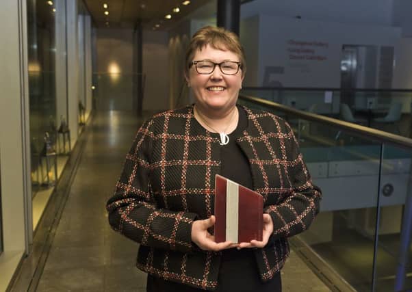 Deena Wren, librarian at Beeslack Community High School, with her Learning Professional Award, at the Scottish Book Trust Awards. Photo by Alasdair Watson Photography.