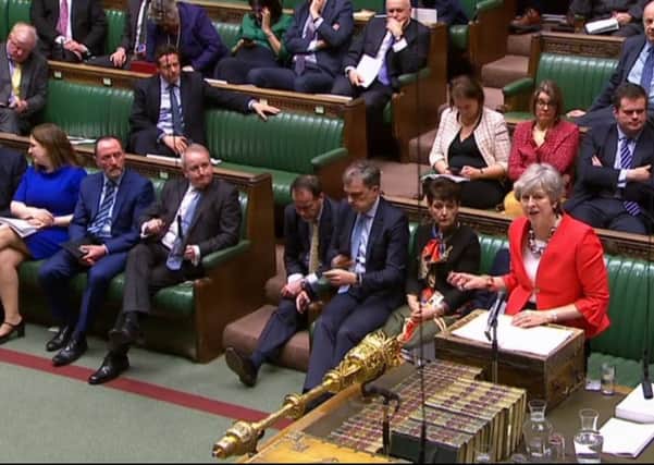 Theresa May addresses the House of Commons ahead of the second 'meaningful vote' on her Brexit deal (Picture: AFP/Getty Images)