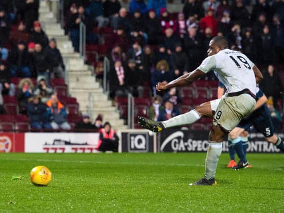 Uche Ikpeazu misses the chance to put Hearts 3-1 up from the spot.