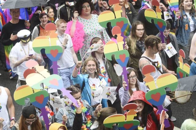 Last years Pride march in Edinburgh attracted crowds, but some LGBTQ+ young people are still facing stigma and rejection. Picture: Greg Macvean