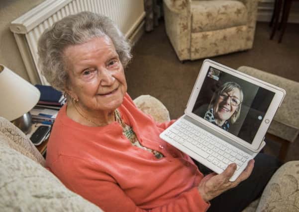 Nan keeps in touch with daughter Dorothy over the internet. Picture: Chris Watt